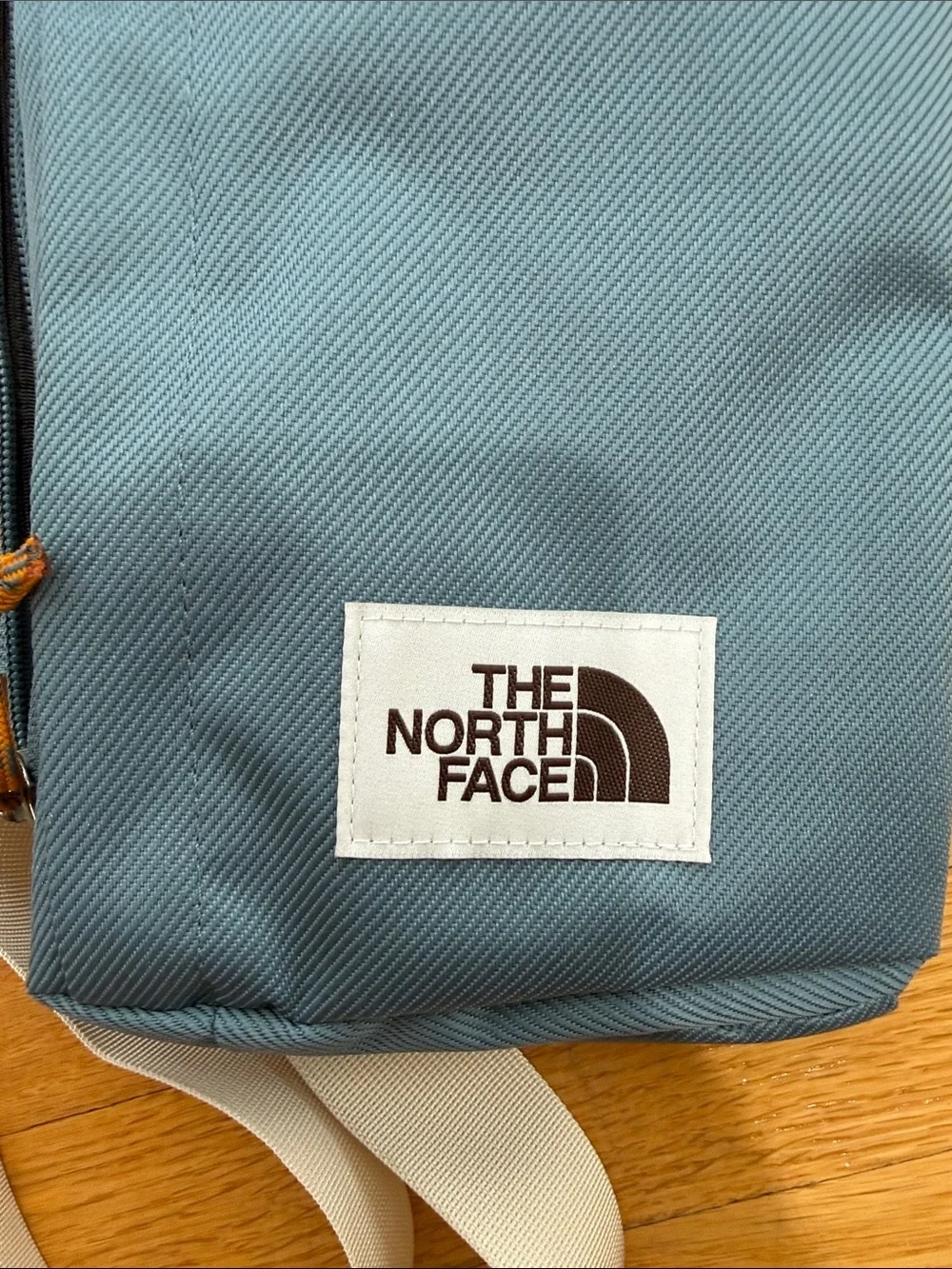 The North Face Teal Sling Bag with Cream Strap New with Tags